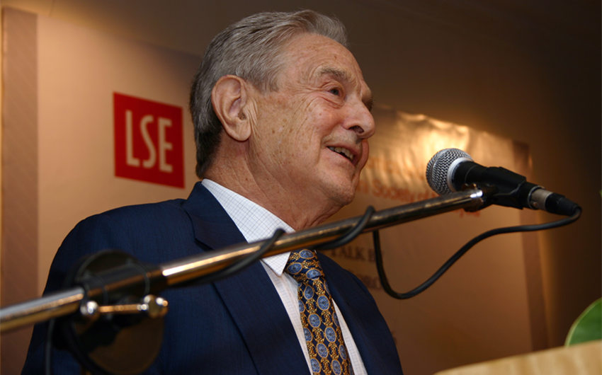 how old is george soros wife